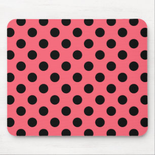 Zwarte polka-punten op koraal muismat