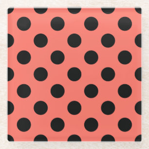 Zwarte polka-punten op levend koraal glazen onderzetter