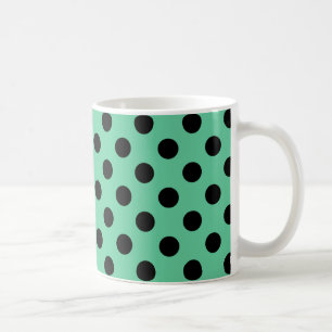 Zwarte polka-punten op muntgroen koffiemok