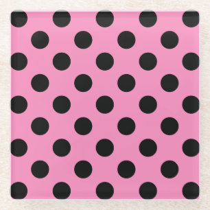 Zwarte polka-stippen op roze glazen onderzetter