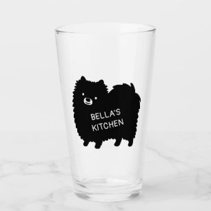 Zwarte Pommerse Schattigee hond met aangepaste t Glas