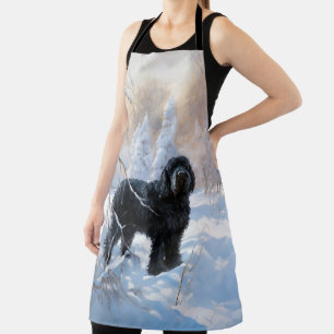 Zwarte Russische terriër laat het sneeuwen Kerstmi Schort