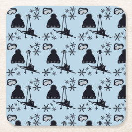 Zwarte ski-uitrusting & sneeuwvlokken op blauw vierkante kartonnen onderzetter