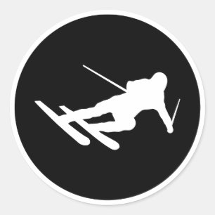 zwarte skisicon neerwaarts ronde sticker