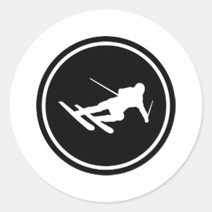 zwarte skisicon neerwaarts ronde sticker
