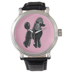 Zwarte standaard poedel met roze horloge