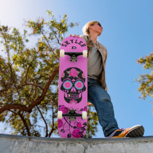 Zwarte suikerschedel op roze dd-merk skateboard
