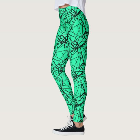 Zwarte turkooizen abstract leggings (Links)