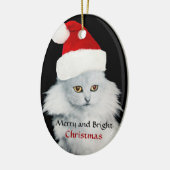 ZWARTE WITTE KERSTKATER MET KERSTMANSHOED KERAMISCH ORNAMENT (Links)